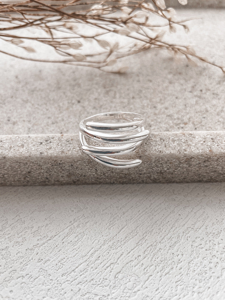 Anillo cruzado regulable