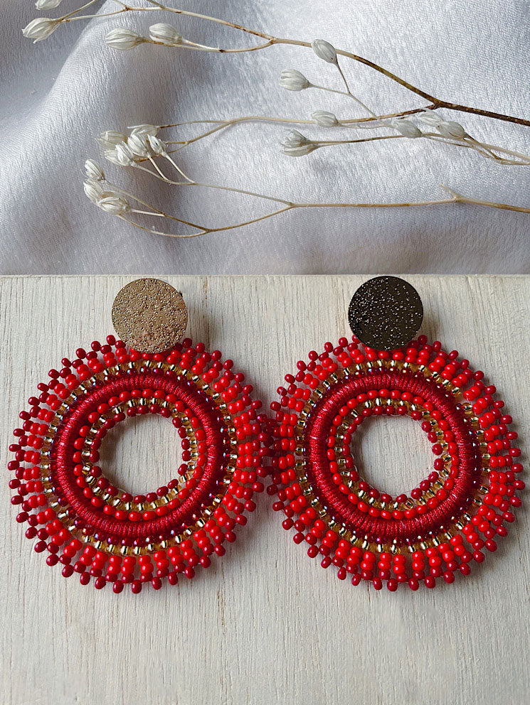 Aretes círculo con hueco y mostacillas