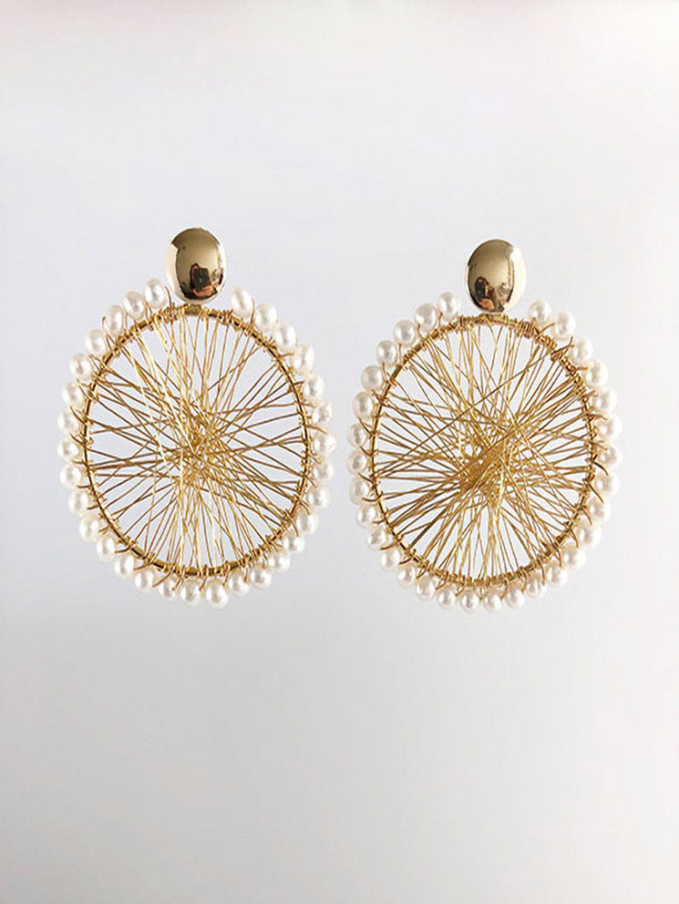 Aretes círculo telaraña con perlas alrededor