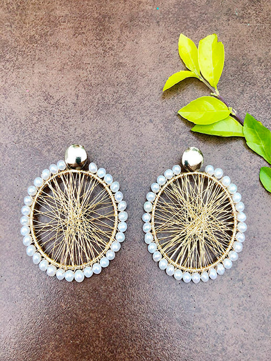 Aretes círculo telaraña con perlas alrededor