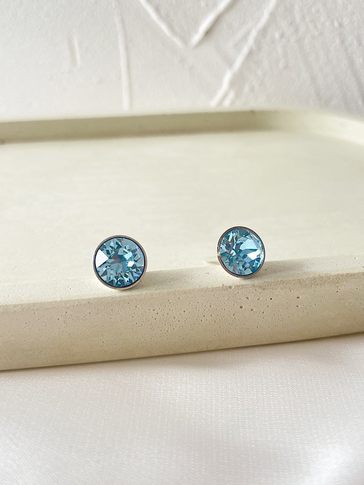 Aretes pegados punto de luz Swarovski