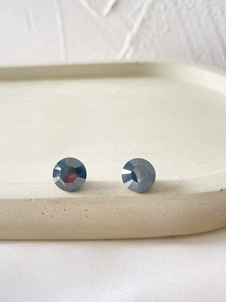 Aretes pegados punto de luz Swarovski