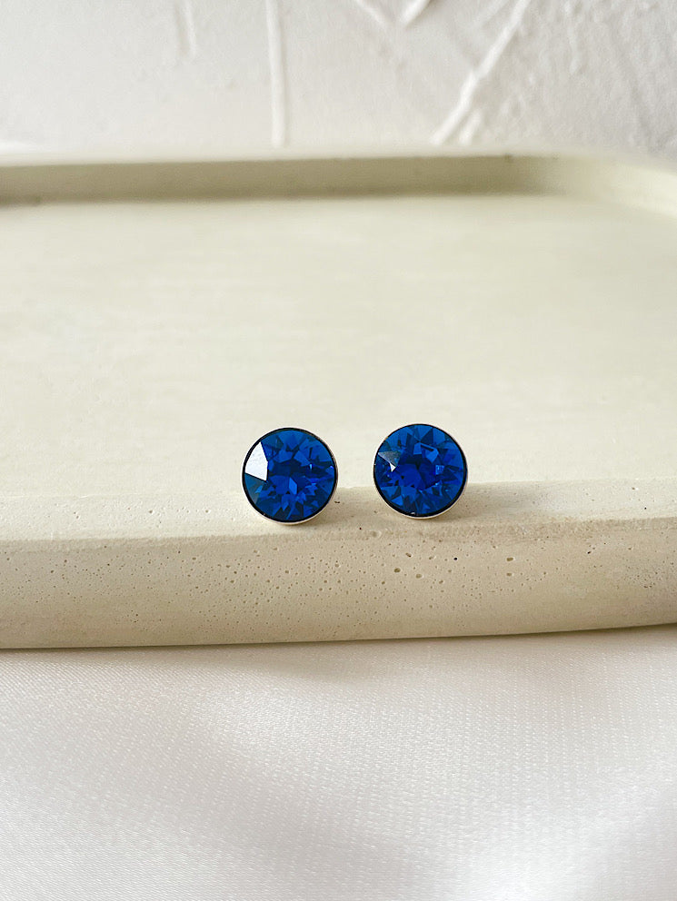 Aretes pegados punto de luz Swarovski