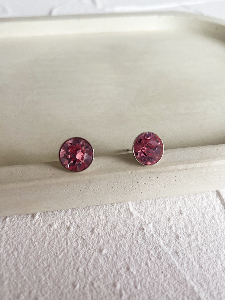 Aretes pegados punto de luz Swarovski