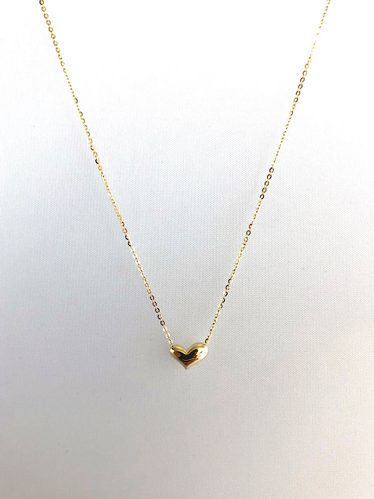 Cadena con dije corazón bombeado