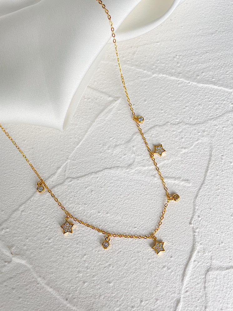 Collar estrellas y donitas con circón