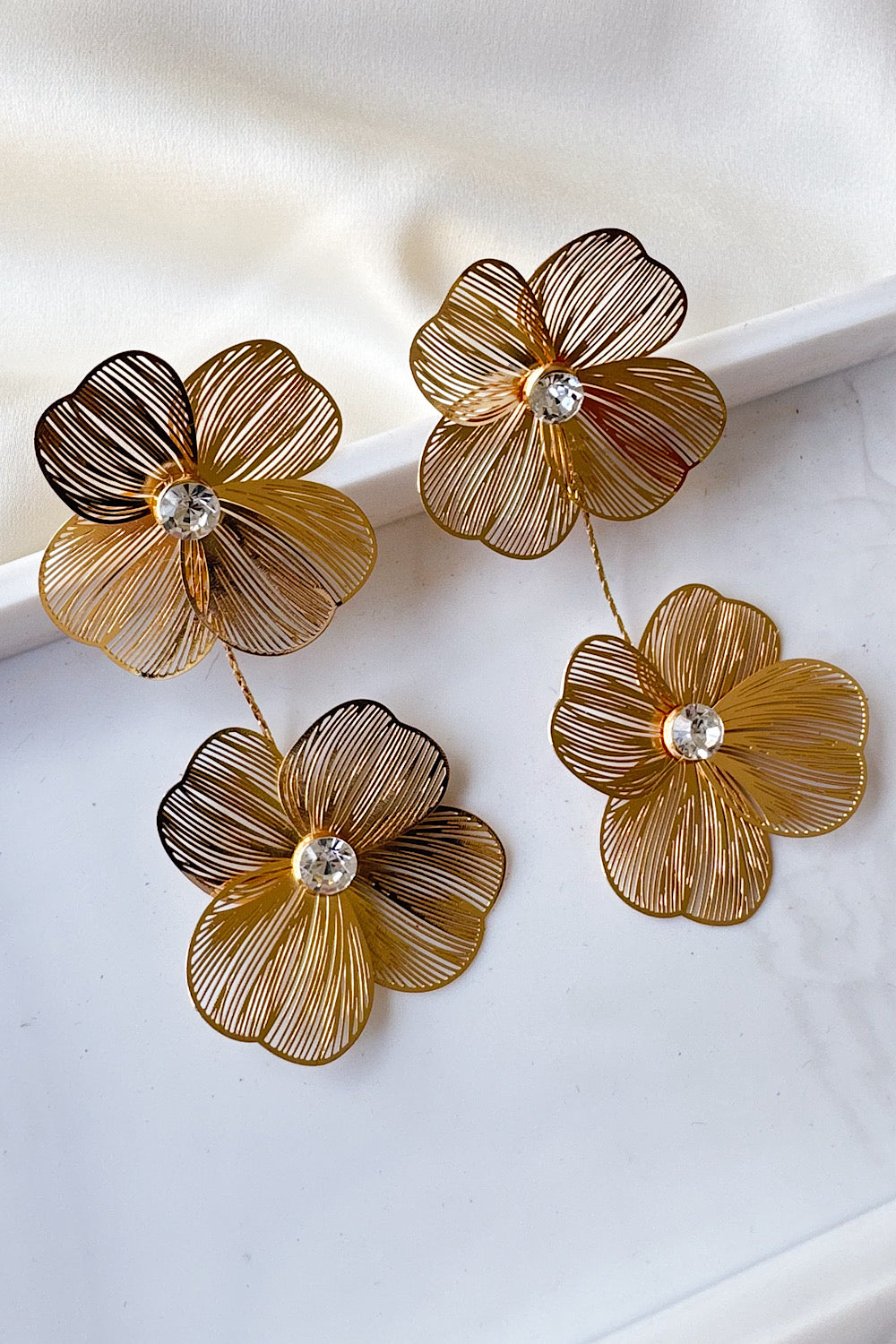 Aretes 2 flores caladas 4 hojas