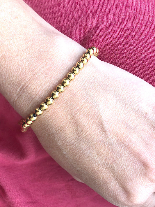 Pulsera bolitas con cadena