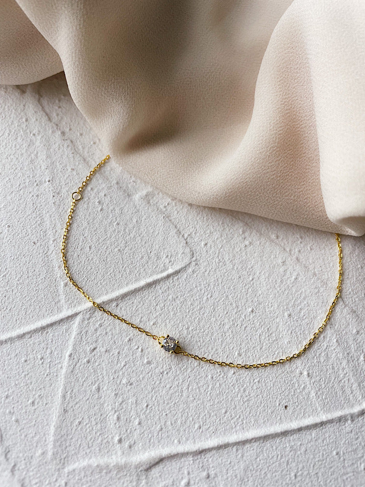 Pulsera cadena con circón en medio
