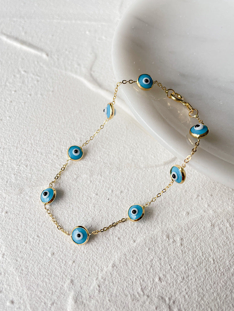 Pulsera cadena con ojitos turcos celestes