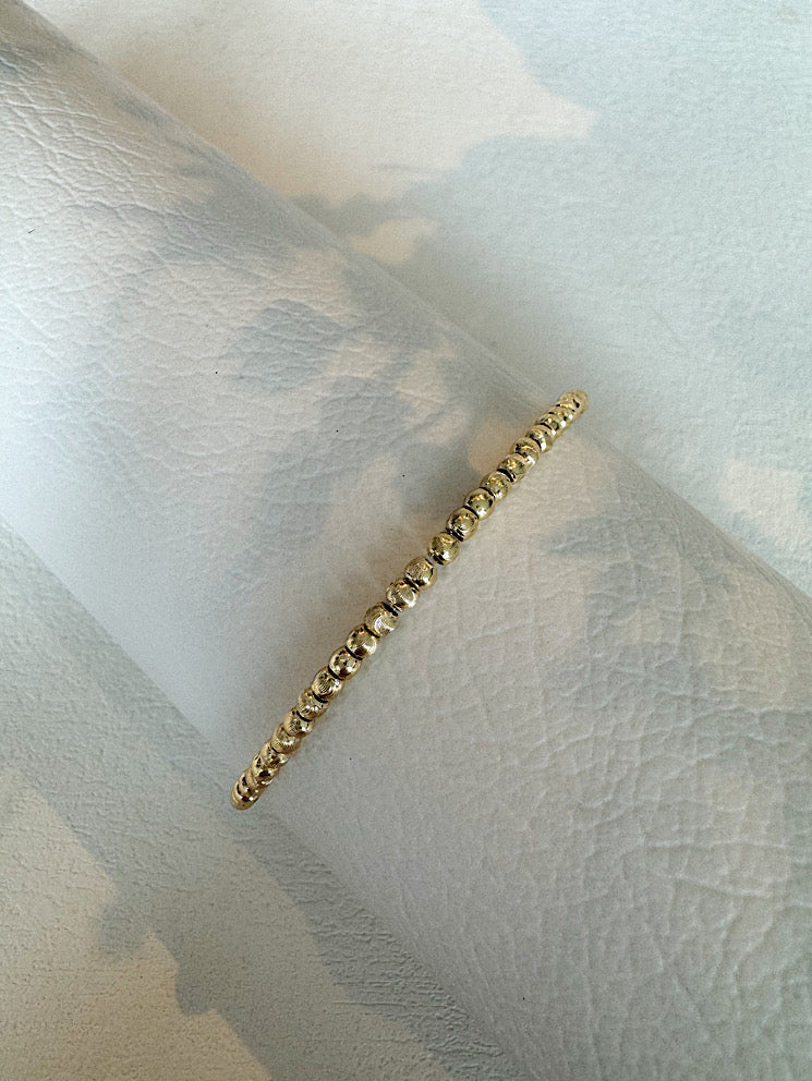 Pulsera elástica bolitas facetadas 3mm