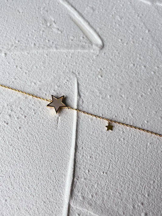 Pulsera estrella con nácar y estrella lisa