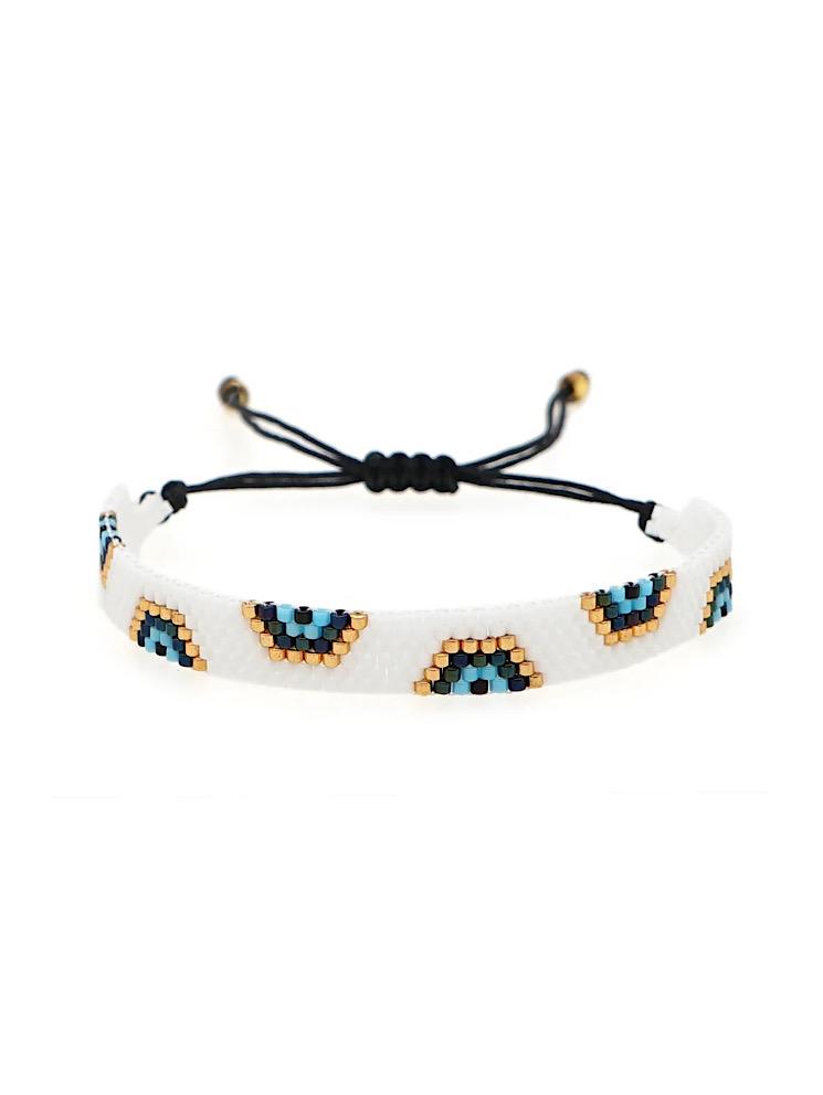 Pulsera tejida miyuki 6 filas blancas con ojos turcos blanca