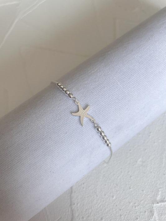 Pulsera regulable estrella de mar con bolitas