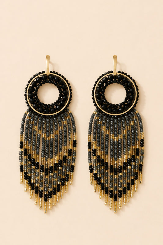 Aretes círculo con tiras colgando