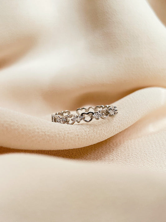 Anillo corazones y circones intercalados regulable