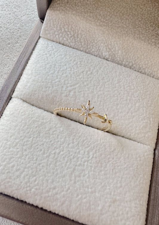 Anillo estrellita con circones y lunita lisa abierto regulable