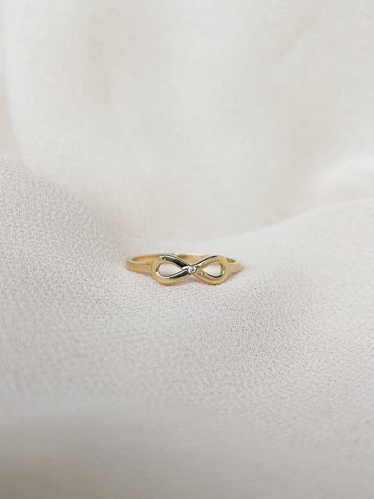 Anillo infinito con 1 circón en medio
