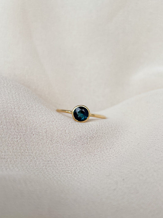 Anillo turmalina azul redondo