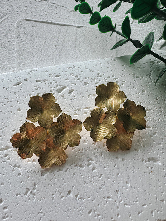 Aretes 4 flores satinadas en rombo