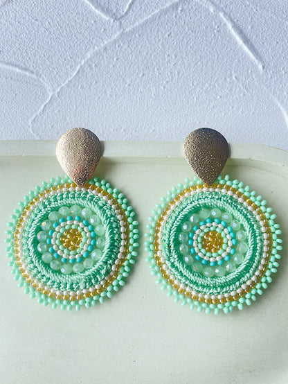 Aretes círculo tejido con hilo y mostacillas