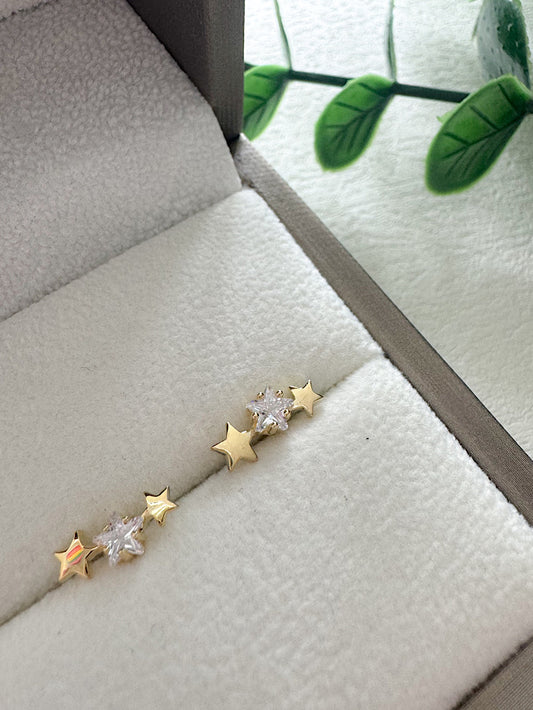 Aretes pegados trepadores estrellas