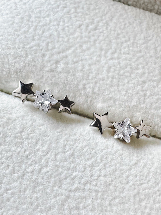 Aretes pegados trepadores estrellas