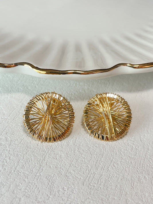 Aretes pegados circulo telaraña