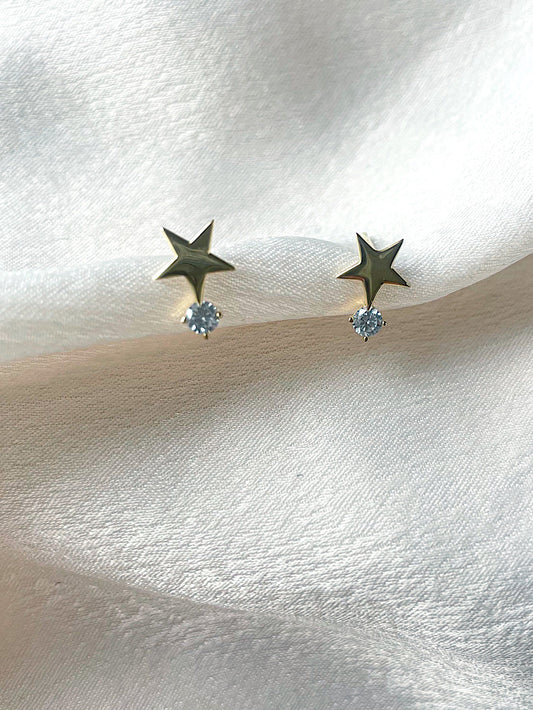 Aretes pegados estrella con circón abajo