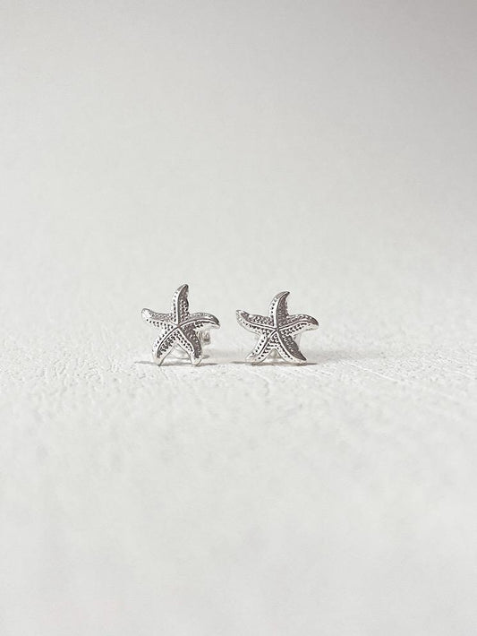 Aretes pegados estrella de mar