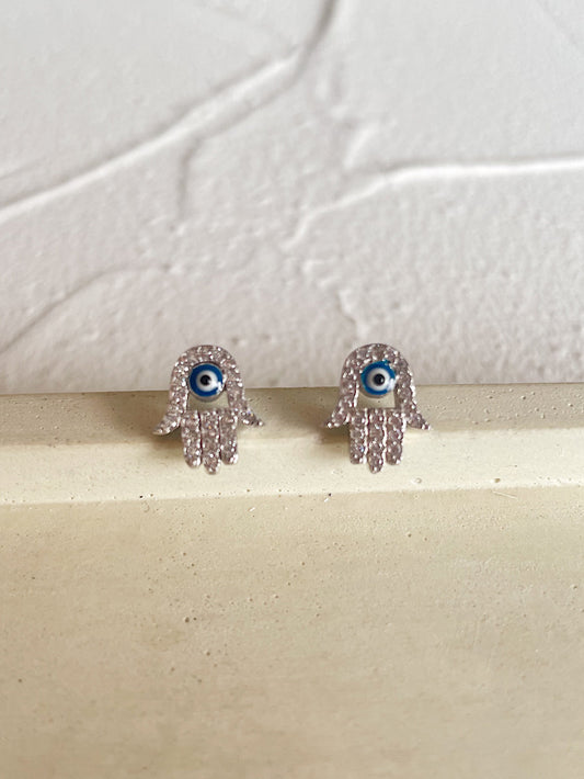 Aretes pegados manito con circones