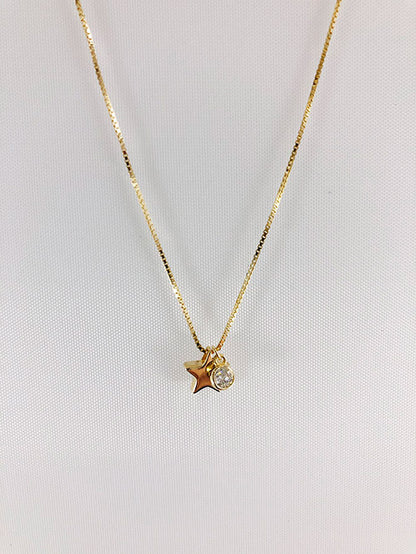 Cadena enchapada con dije estrellita con circón colgando