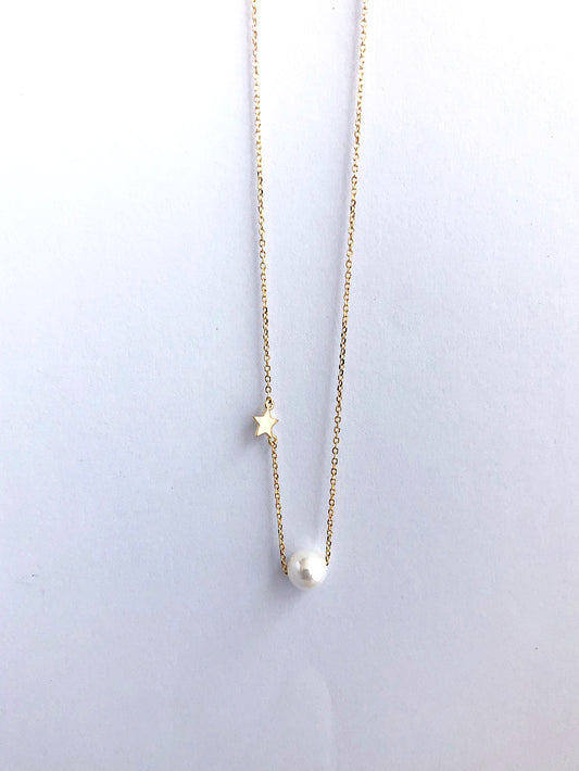 Cadena con perla pasante y estrellita