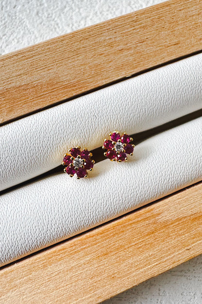 Aretes pegados flor seguro de bebé