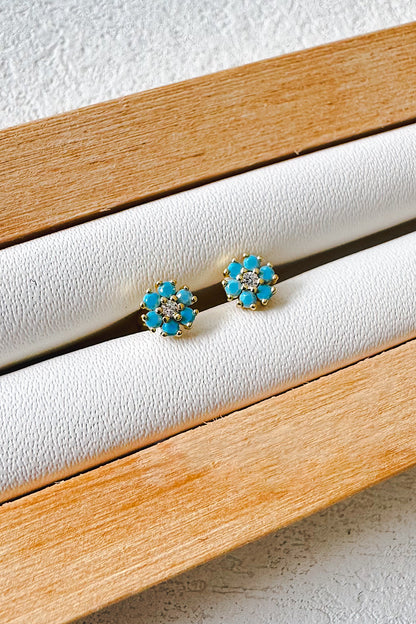 Aretes pegados flor seguro de bebé