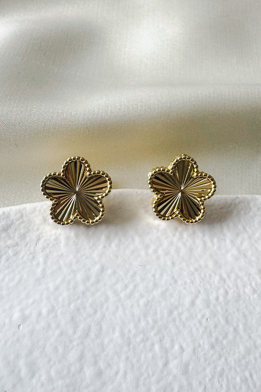 Aretes pegados flor