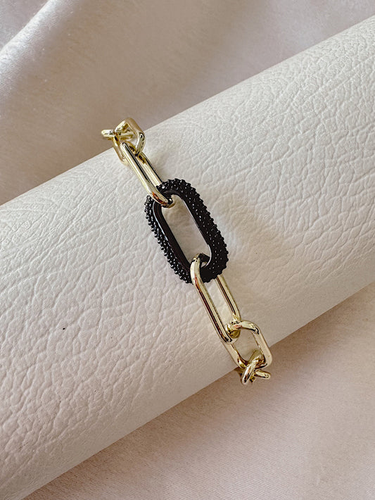 Pulsera paper clip con argolla negra con circones