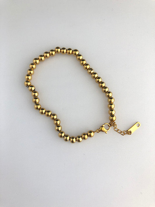 Pulsera bolitas con cadena