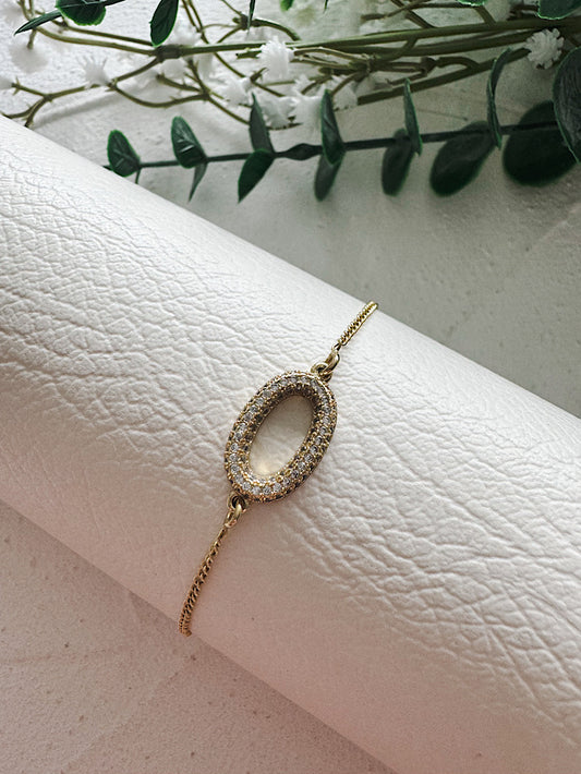 Pulsera cadena con dije argolla con circones