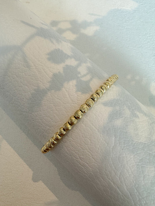Pulsera elástica bolitas facetadas 4mm