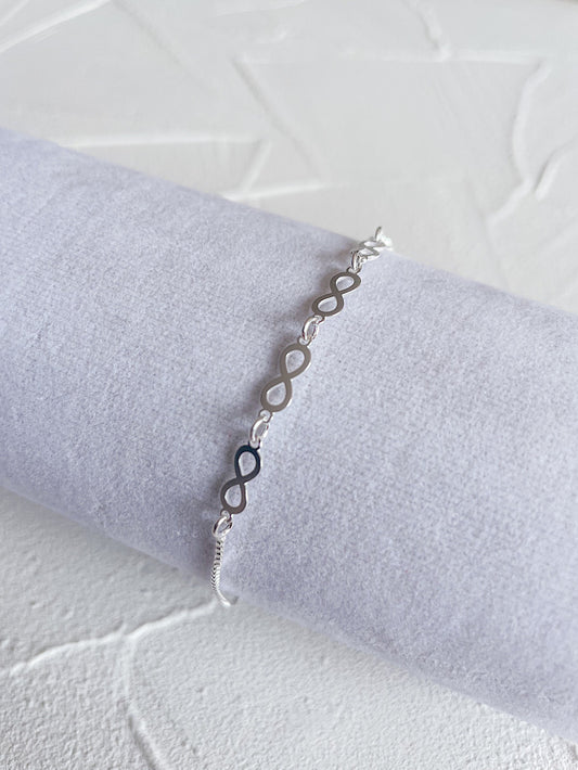 Pulsera regulable 5 infinitos