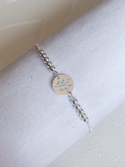Pulsera regulable placa con hoja calada con bolitas lisas