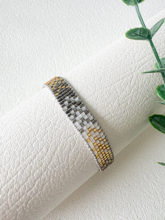Pulsera tejida miyuki 5 filas tonos plomos