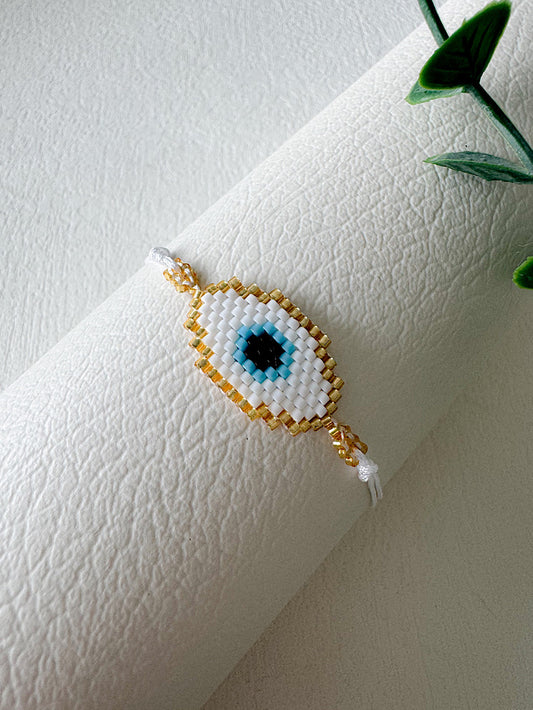 Pulsera tejida miyuki ojo turco blanco