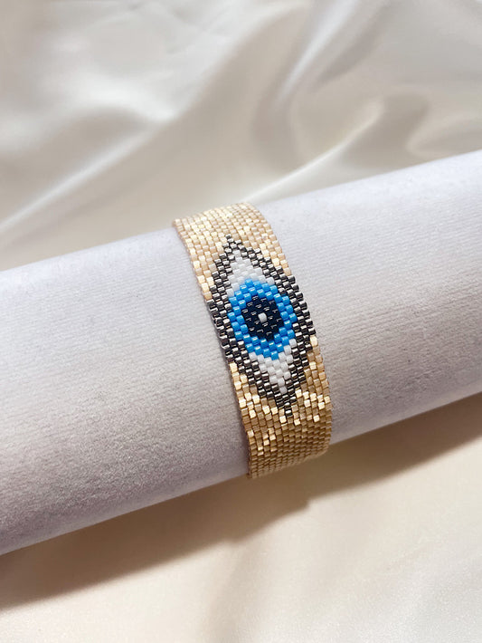 Pulsera tejida miyuki con ojo turco en medio