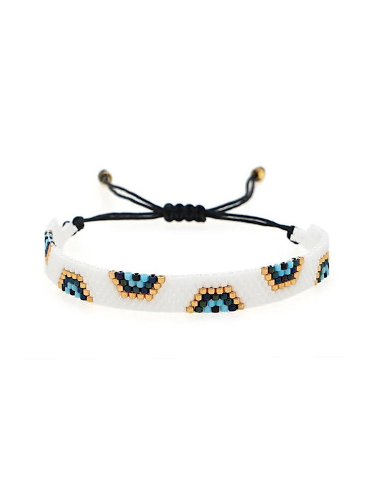 Pulsera tejida miyuki 6 filas blancas con ojos turcos blanca