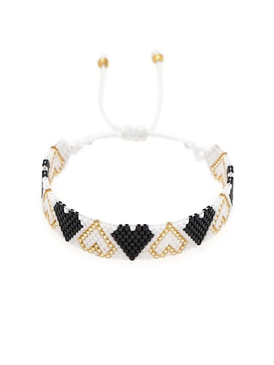 Pulsera tejida miyuki 9 filas blanca con corazones negros y dorados