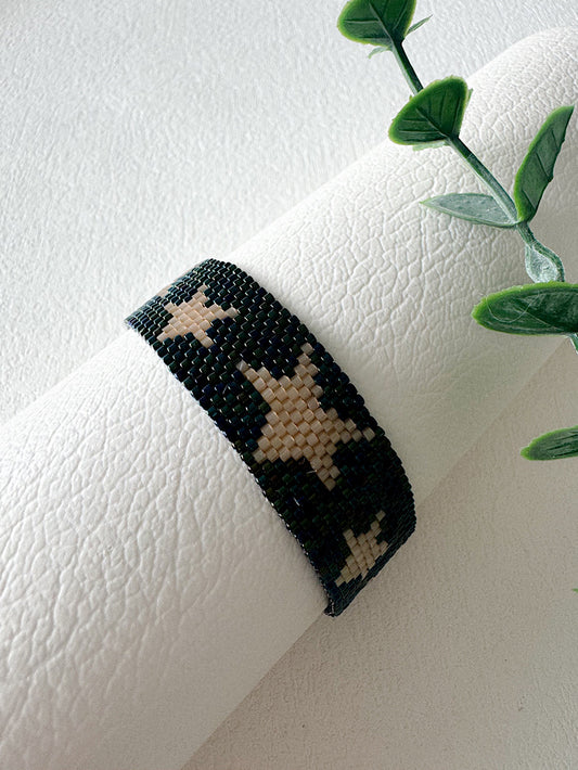 Pulsera tejida 14 filas acero con estrellas doradas